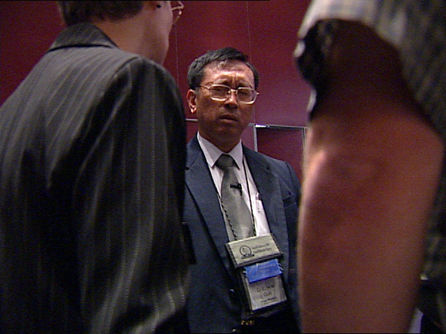 Noel Goh and the 250 other prayer delegates volunteer their time to pray with people they’ve never met, and may never see again. Video still by UMTV/United Methodist Communications