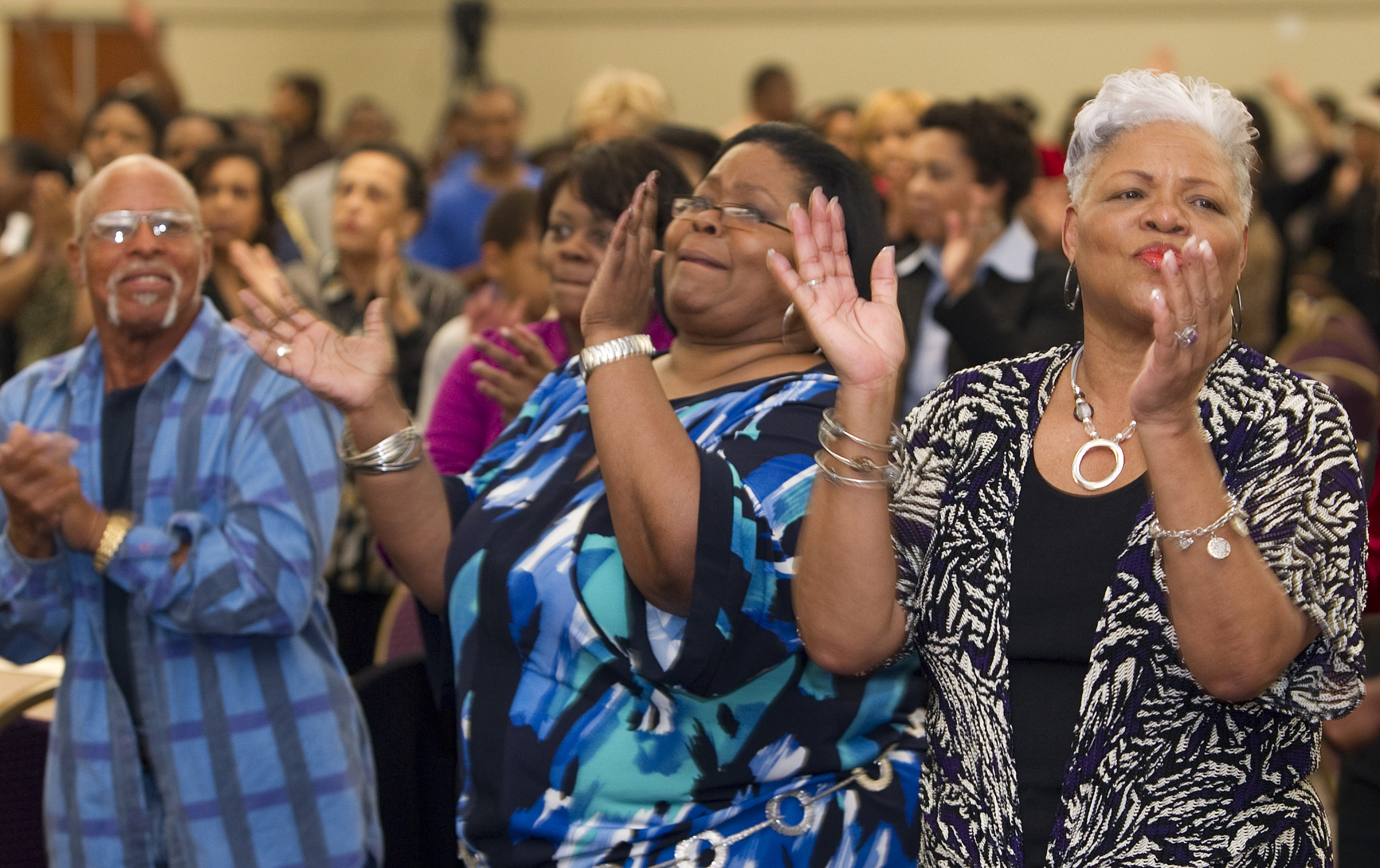 Worshipers sing during a Wednesday evening gathering at Kindgom Builders Center, Windsor Village United Methodist Church in Houston in this 2011 file photo. A UMNS photo by Mike DuBose.