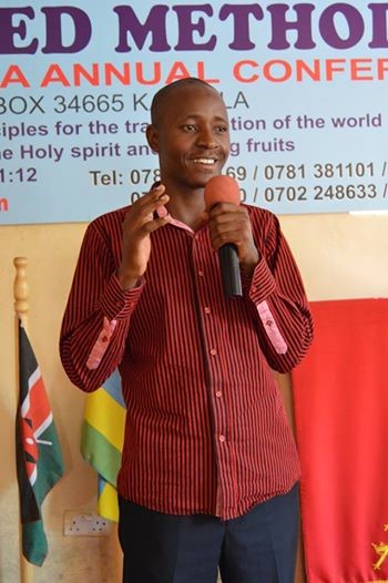Joseph Kanyike speaks in this 2011 photo during a youth service at Kireka United Methodist Church. He is among the United Methodists pushing for greater financial accountability among bishops. Photo courtesy of Joseph Kanyike
