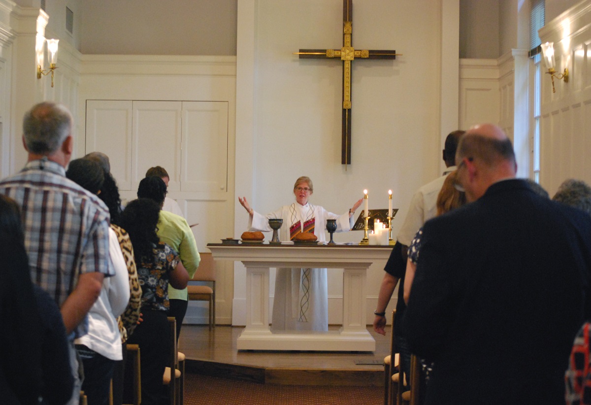 The Rev. Susan Henry-Crowe, top executive of the United Methodist Board of Church and Society, presides over communion during the board’s Sept. 23 worship service at the chapel in the United Methodist Building on Capitol Hill. 