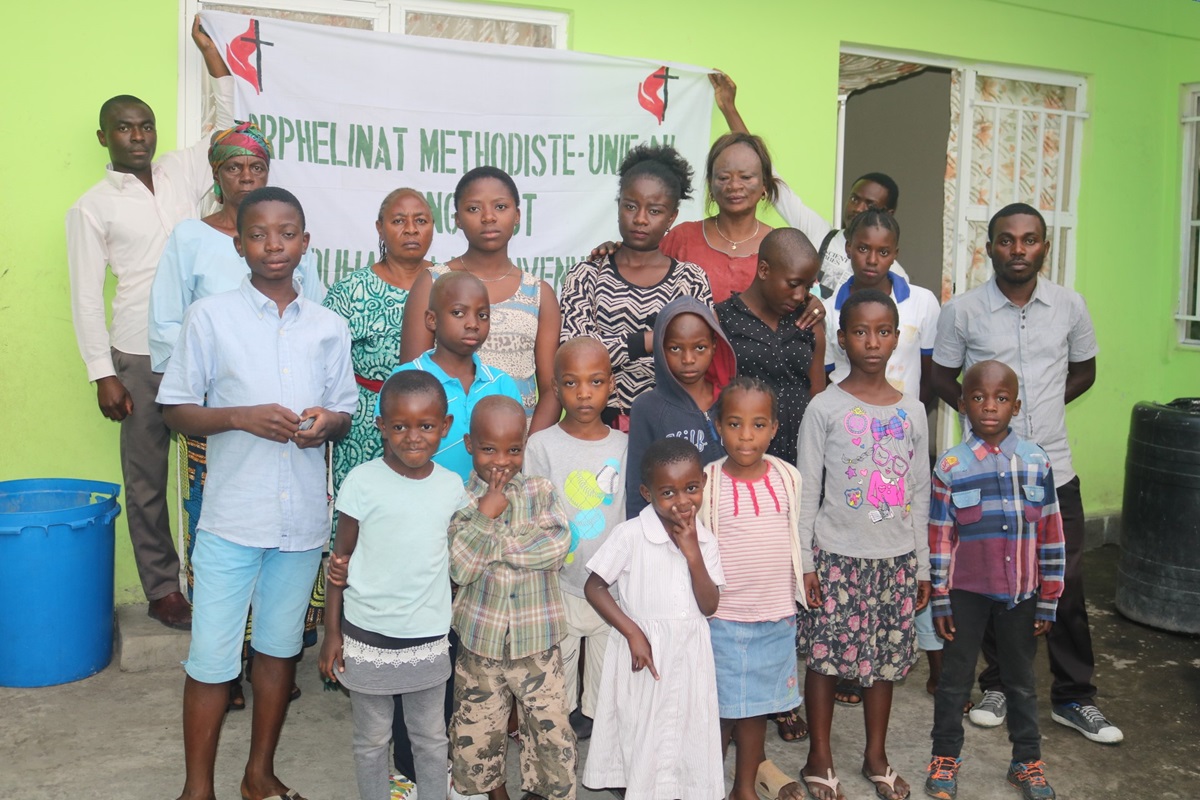 Mother Adolphine Olela Okako (back row, second from right) has been taking care of orphans for more than 20 years with support from The United Methodist Church in the Democratic Republic of Congo. Here, she poses with some of the orphans in her care. Photo by Philippe Kituka Lolonga, UMNS.