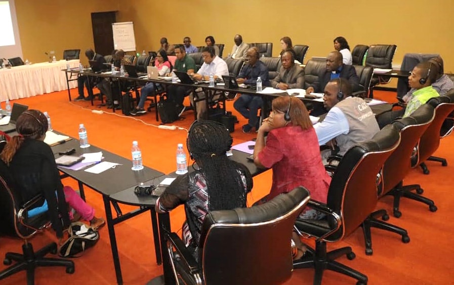 Attendees of the United Methodist Radio Network annual meeting listen on headsets during part of the conference, April 25-27, in Kampala, Uganda. Photo by the Rev. Taurai Emmanuel Maforo.