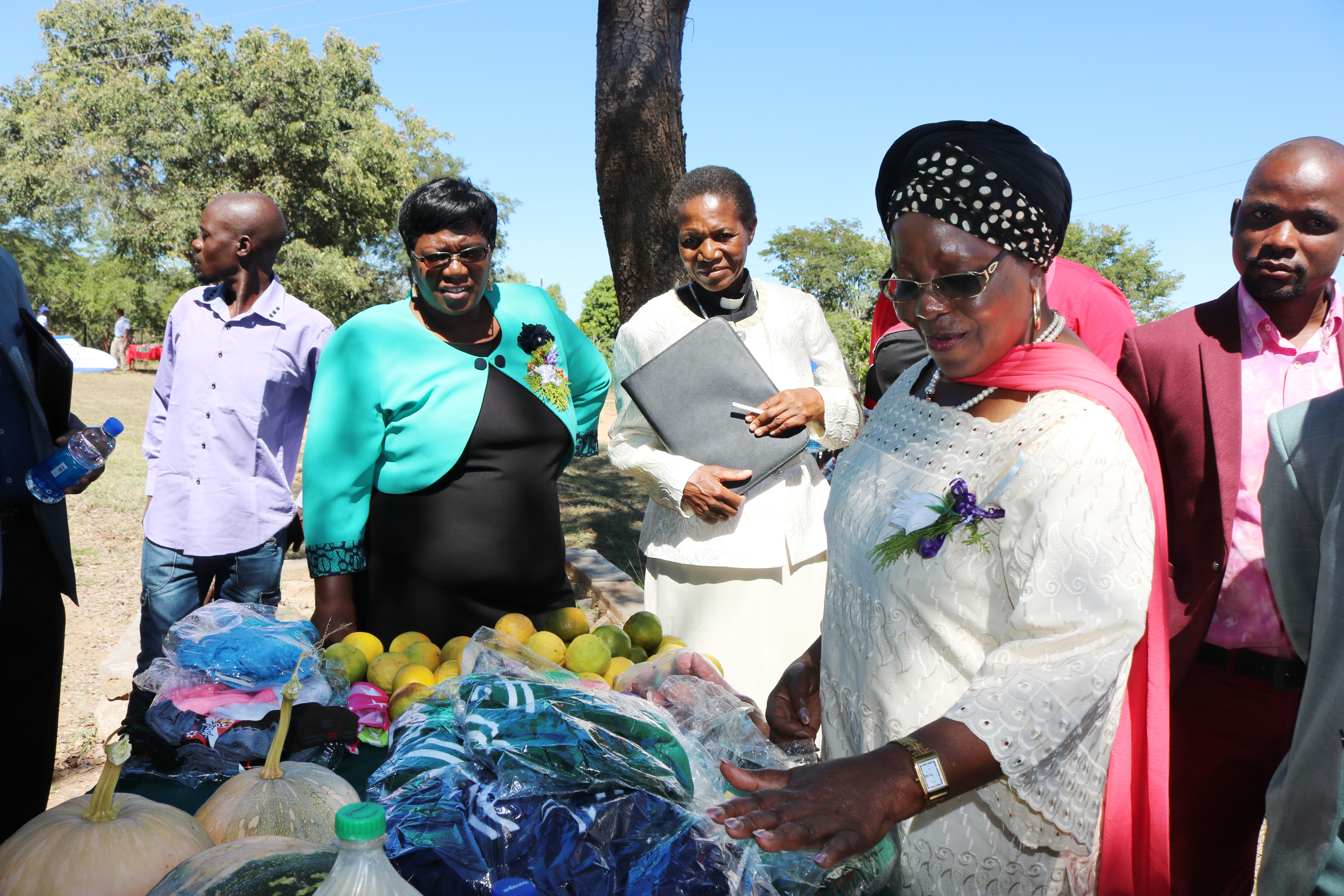 Sithembiso Nyoni, Zimbabwe’s Women and Youth Affairs minister, visits a booth at a recent economic expo hosted by The United Methodist Church in Marange, Zimbabwe. Nyoni was the guest of honor at the event, which aimed to offer business opportunities to people living in rural communities. Photo by Priscilla Muzerengwa, UMNS. 
