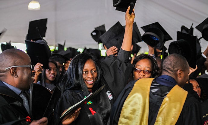 Students and faculty celebrate graduation at Africa University. The school’s vice chancellor, Munashe Furusa, encouraged the graduates to “go forth and build an Africa that we all want and deserve to live in.” Photo courtesy of Africa University.