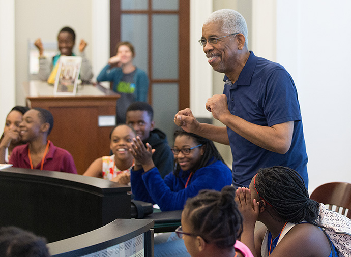 Rip Patton enjoys a cheer from students with the Nashville Freedom School Partnership during a visit to the Civil Rights Room at the Nashville (Tenn.) Public Library in 2017. File photo by Mike DuBose, UM News.