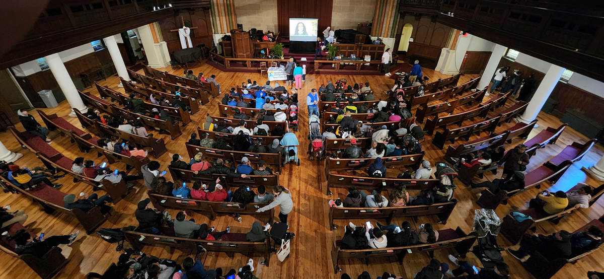 St. Paul and St. Andrew United Methodist Church in New York City is seeing large crowds each Monday morning as it welcomes migrants bused into Manhattan. The church calls them Miracle Mondays, and with help from partner organizations a range of assistance is offered, including meals, hygiene products and legal counseling. Crowds have steadily grown. Photo courtesy of St. Paul and St. Andrew United Methodist Church.