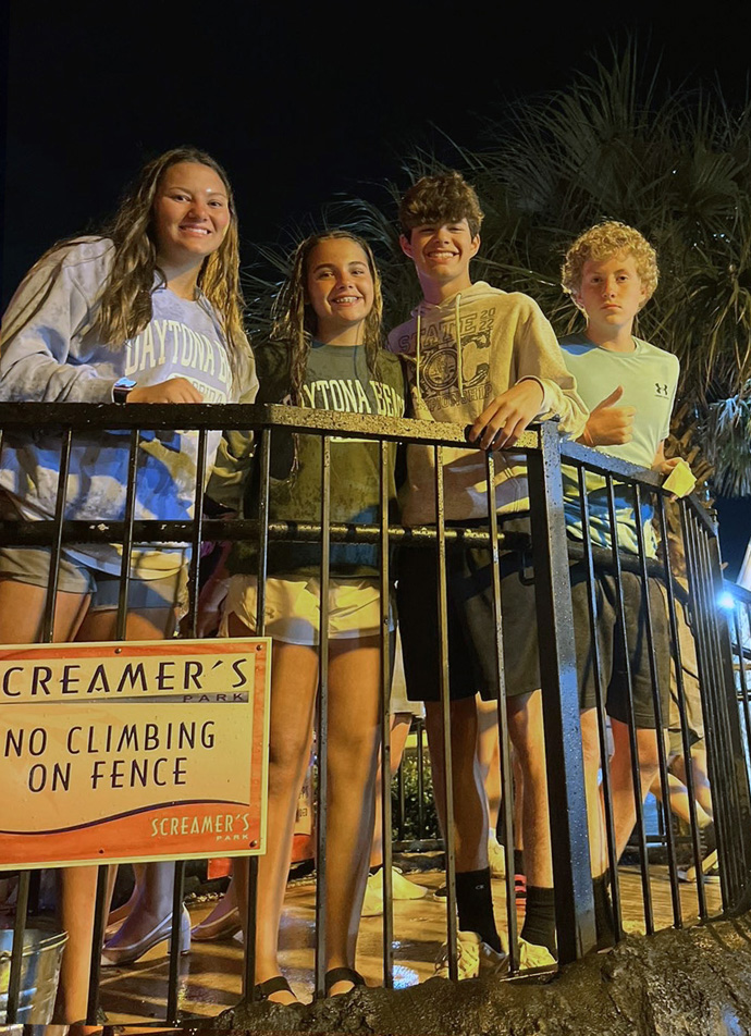 Zander Seth (third from left), a freshman at Kansas State University, was “adopted” by First Chanute United Methodist Church as his youth group was unable to attend. Seth said the most memorable parts of Youth 2023 in Daytona Beach, Fla., were making new friends and being able to co-lead a workshop. Pictured with Seth are (from left) Addie Finley, Syrenity Shields and Jackson Osborn. Photo by Max Robinson, courtesy of Zander Seth.