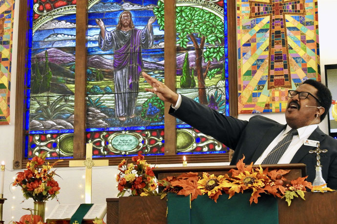 The Rev. Marcus Freeman, a district superintendent in the Rio Texas Conference, preaches during a Nov. 19 worship service at La Trinidad United Methodist Church in Seguin, Texas. Members of the new Walnut Springs United Methodist Church joined La Trinidad for the service, and Freeman’s message was titled “Estamos Todos Juntos en Esto” or “We Are All in This Together.” Photo by Sam Hodges, UM News.