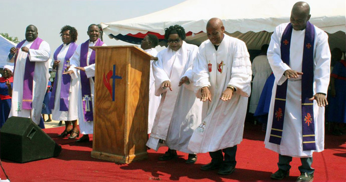 Bishop Eben K. Nhiwatiwa (second from right) and members of his cabinet dance during a musical performance at the United Methodist Zimbabwe East Conference Healing Convention at Mufusire Farm in October. A similar convention was held in the Zimbabwe West Conference to help people heal after the COVID-19 pandemic. The bishop called the gatherings marvelous and said people were healed spiritually and holistically. Photo by Kudzai Chingwe, UM News. 