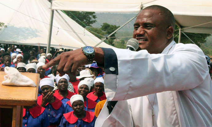 Gift Kufazvineyi, a fourth-year student at United Theological College, preaches during the Zimbabwe East Conference Healing Convention at Mufusire Farm in October. Photo by Kudzai Chingwe, UM News. 