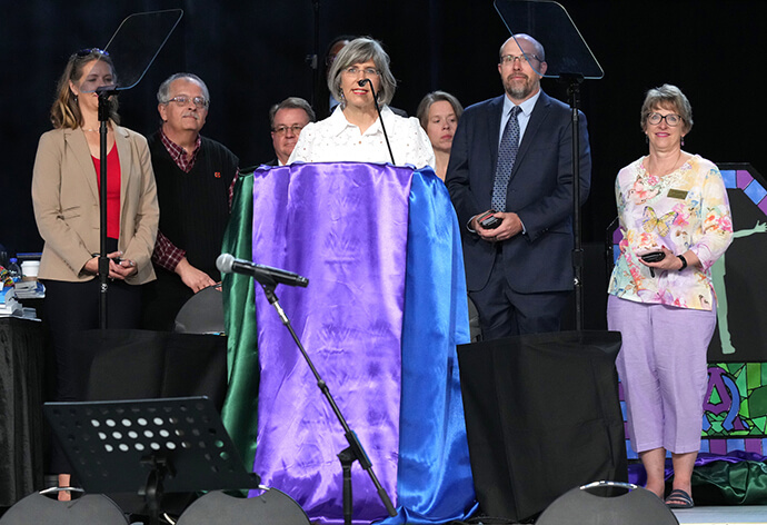 The Rev. Kim Ingram, chair of the Interjurisdictional Committee on the Episcopacy and a delegate from the Western North Carolina Conference, speaks on May 3 during the United Methodist General Conference in Charlotte, N.C. The committee was tasked with making a recommendation on how many bishops the U.S. should have. Photo by Larry McCormack, UM News.