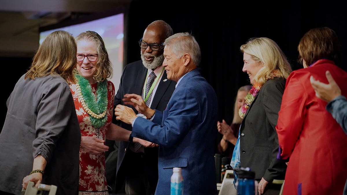 Leaders of the Western Jurisdiction greet the Rev. Sandra K. Olewine (second from left) as she takes the stage after being elected a United Methodist bishop during the jurisdictional conference July 12 in Spokane, Wash. She was elected on the 17th ballot. Photo by Patrick Scriven, Western Jurisdiction.