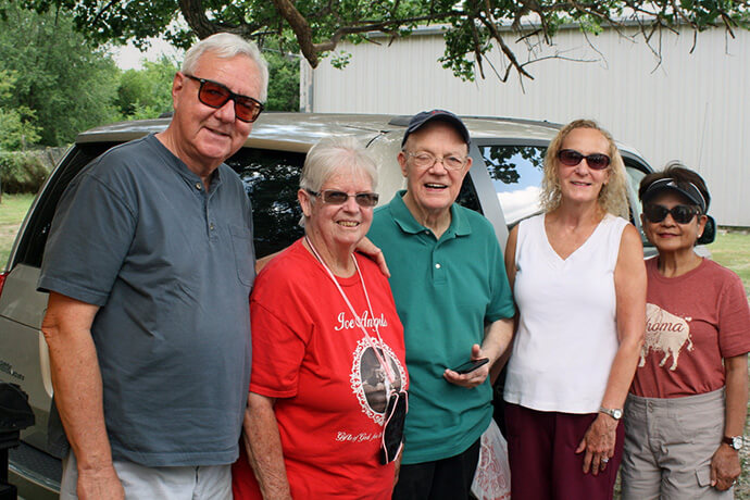 Mary Kaplan (second from left), who co-founded Ice Angels with her husband, the late Lenny Kaplan, poses with representatives from two of the congregations that serve lunches as part of the ministry. With Kaplan are (from left) Jim Porterfield and Ron Osborn of Quail Springs United Methodist Church in Oklahoma City, Cecilia Sharpe of Grace Episcopal Church in Yukon, Okla., and Aimee Porterfield, also from Quail Springs. Photo by Boyce Bowdon, UM News.