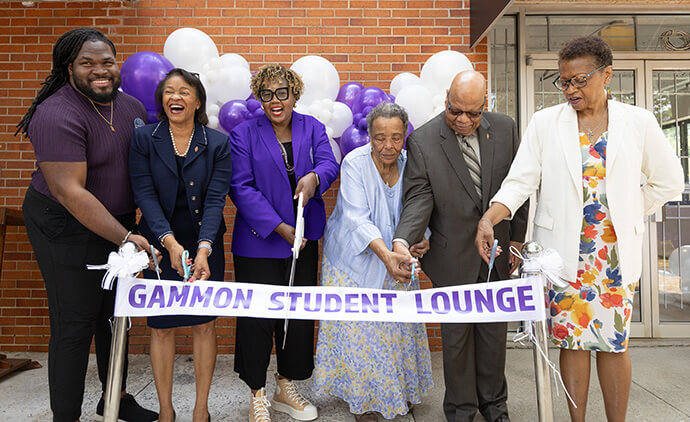 Alumni, faculty and supporters cut the ribbon on the renovated student lounge at Gammon Theological Seminary. From left are the Rev. Kylan Pew, Bishop Sharma D. Lewis, the Rev. Candace M. Lewis, Board of Trustees member Mackie Norris, Bishop Alfred Norris and the Rev. Katurah Johnson. Photo by Mike DuBose, UM News.