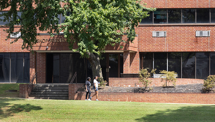 Students make their way past Talbot Hall at Turner Theological Seminary in Atlanta. That school and Gammon Theological Seminary have left the Interdenominational Theological Center because of the center’s budget issues. Photo by Mike DuBose, UM News.