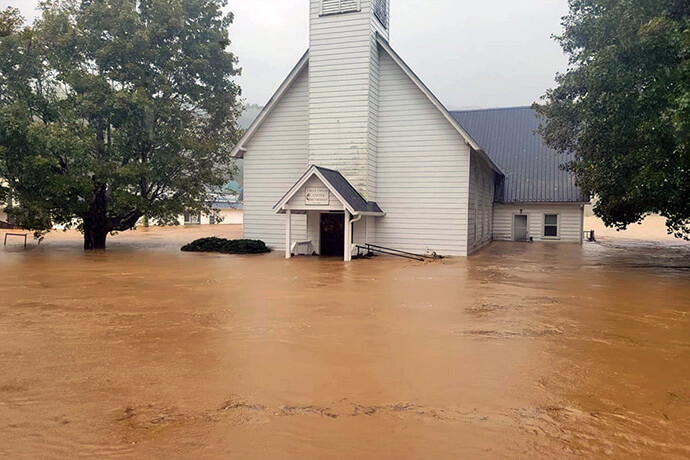 A view of Valle Crucis United Methodist Church in Valle Crucis, N.C., shows water over the stairs of the entryway after flooding caused by Hurricane Helene devastated western North Carolina and other parts of the southeastern United States last week. Bishop Ken Carter, who leads the Western North Carolina Conference, said it’s estimated that more than half of the 44 counties in the annual conference have been affected. Photo courtesy of the Western North Carolina Conference.