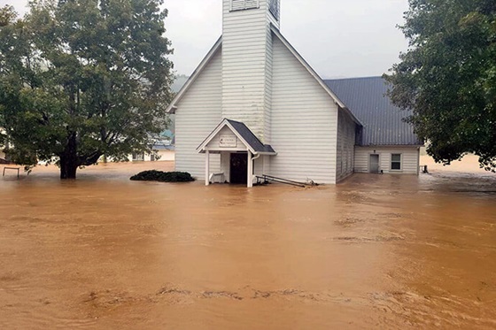 A view of Valle Crucis United Methodist Church in Valle Crucis, N.C., shows water over the stairs of the entryway after flooding caused by Hurricane Helene devastated western North Carolina and other parts of the southeastern United States last week. Bishop Ken Carter, who leads the Western North Carolina Conference, said it’s estimated that more than half of the 44 counties in the annual conference have been affected. Photo courtesy of the Western North Carolina Conference.