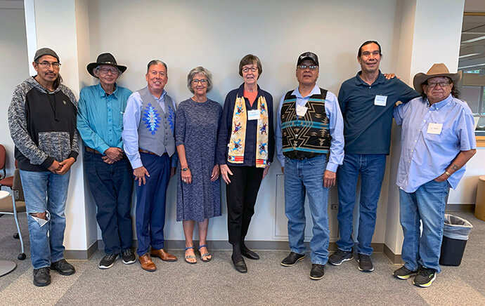 Sand Creek tribal representatives and United Methodist bishops make up part of the United Methodist Responses to the Sand Creek Massacre Team, which met Sept. 20-21 at Iliff School of Theology. Pictured from left are Fred Wallowing Bull, Northern Arapaho (Wyoming); Eugene Ridgely Jr., Northern Arapaho (Wyoming); Great Plains Bishop David Wilson; retired Bishop Hope Morgan Ward; retired Bishop Elaine JW Stanovsky; Otto Braided Hair Jr., Northern Cheyenne (Montana); Chris Tall Bear, Southern Cheyenne and Arapaho (Oklahoma); and Gail Ridgely, Northern Arapaho (Wyoming). Photo by Joey Butler, UM News.