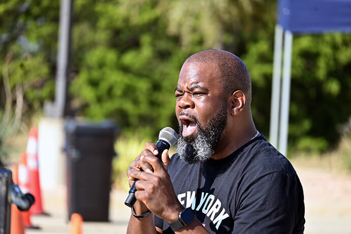 The Rev. Keith L. Somerville, lead pastor of The Village United Methodist Church in DeSoto, Texas, preaches a sermon on Oct. 27 in the parking lot of the church. Photo by Jim Patterson, UM News.