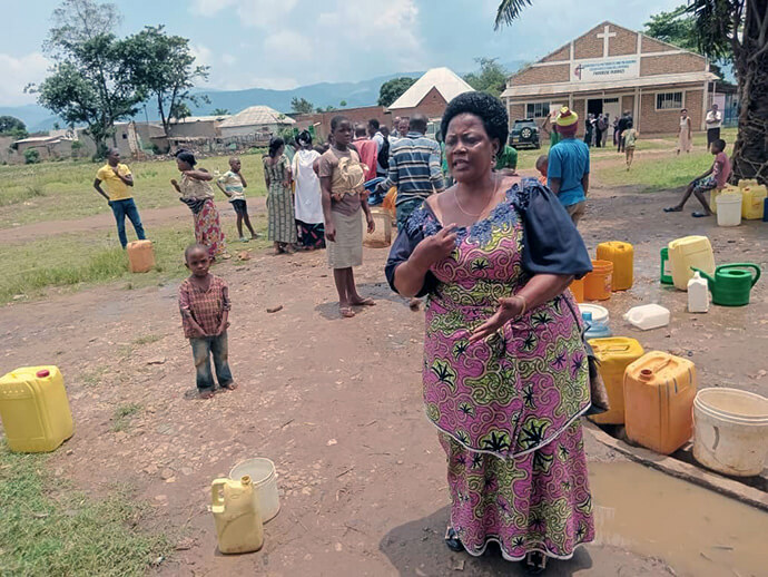 The Rev. Cimpaye Valentine, superintendent of the Bujumbura District, calls on the surrounding population to secure the borehole and ensure its proper use. The borehole is the result of a project financed by the United Methodist Committee on Relief. Photo by Jérôme Ndayisenga, UM News.
