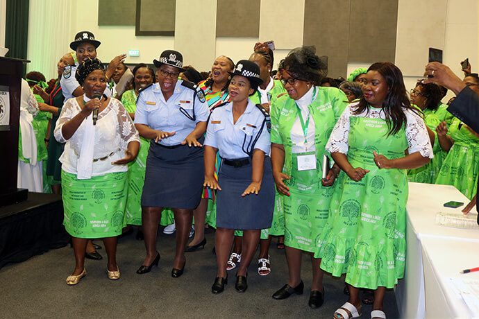 Female police officers from the Botswana Police Service join Methodist women in song and dance during the World Federation of Methodist and Uniting Church Women’s Southern and East Africa seminar held in Gaborone, Botswana. The officers attended the seminar with police commissioner Dinah Marathe, who described gender violence as a pandemic. Photo by Eveline Chikwanah, UM News.