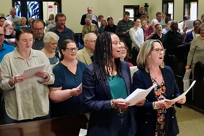 Attendees sing at a May 1 service celebrating the first anniversary of General Conference’s lifting restrictions on LGBTQ participation in The United Methodist Church. Dallas’ Green Hills United Methodist Church hosted the service and was co-sponsor of it with the Center for LGBTQ+ United Methodist Heritage. Photo by Sam Hodges, UM News.