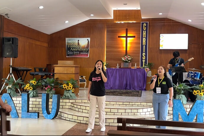 Members of United Methodist Youth Fellowship in the Philippines participate in worship during a three-day workshop. Photo from video by Kyla Ragasa