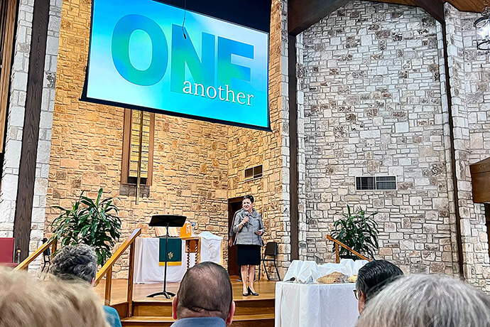 Rio Texas Conference Bishop Cynthia Fierro Harvey shares a message with the congregation of First United Methodist Church of Kerrville, Texas, on July 6. The church opened as a shelter after the Guadalupe River overflowed early on July 4 and has been providing support and respite for families affected by the flooding. “I’m going to ask you to keep praying. Keep praying, because it matters,” Harvey told churchgoers. “In the midst of all of this, God is with us, and his steadfast love endures forever.” Photo by the Rev. Amanda Banda, Rio Texas Conference.