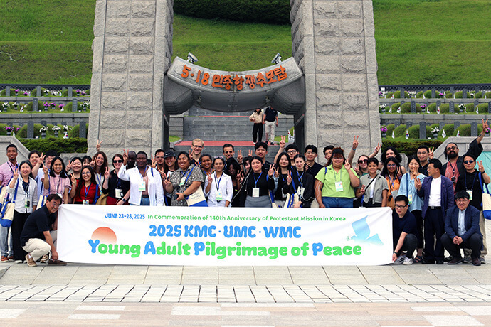 Participants with the 2025 Young Adults Pilgrimage of Peace visit the May 18th Democratic Uprising Memorial Tower at the May 18 Memorial Park in Gwangju, South Korea, on June 24. The pilgrimage, which took place June 23-27, aimed to raise awareness about militarization, promote global peace and justice, and deepen Methodist commitments to reconciliation on the Korean Peninsula. Photo by the Rev. Thomas E. Kim, UM News. 