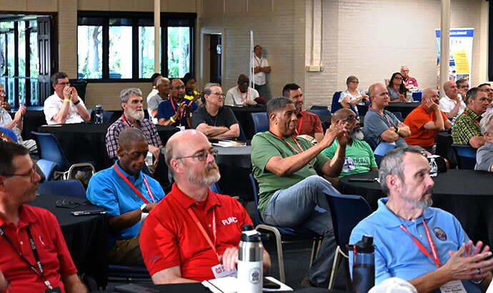 Attendees of the 2025 National Men’s and Scouting Ministry Gathering in St. Simons Island, Ga., listen during a presentation Aug. 2 during the conference. Photo by Jim Patterson, UM News.