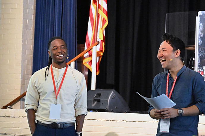 The Rev. Joshua Swanson (left), senior pastor of Wethersfield United Methodist Church in Wethersfield, Conn., and the Rev. Peter Kwon (right), associate pastor of Annandale United Methodist Church in Annandale, Va., make a presentation Aug. 2 about how to attract more young men to participate in church. The event was part of the 2025 National Men’s and Scouting Ministry Gathering in St. Simons Island, Ga. Photo by Jim Patterson, UM News.