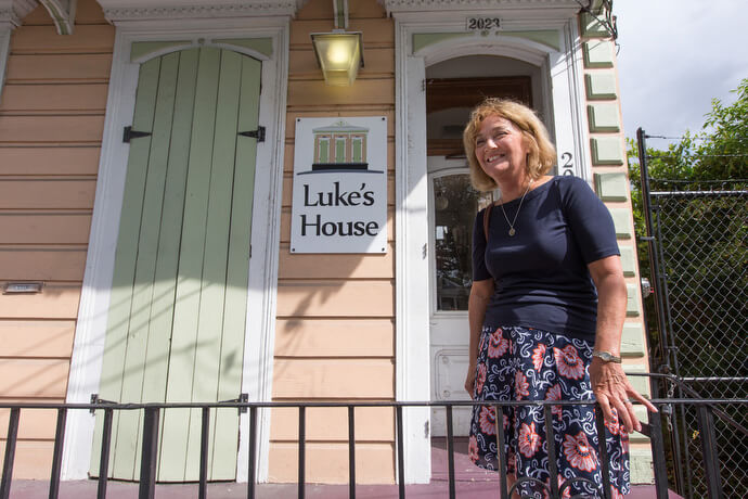 The Rev. Callie Winn Crawford stands on the front stoop of Luke's House in 2015. Crawford  helped found the free health clinic in the aftermath of Hurricane Katrina while serving as senior pastor of Rayne Memorial United Methodist Church in New Orleans. Photo by Mike DuBose, UM News.